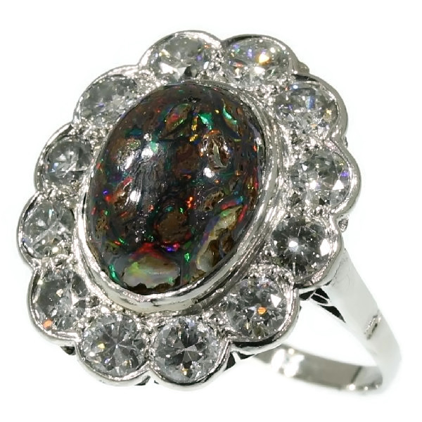 Platinum diamond engagement ring with boulder black opal also called matrix opal